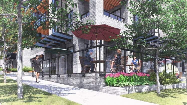 Neighbourhood café with a patio on the ground floor of the Cypress apartment building.