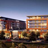 A mixed-use building with upscale retail shops, 123 condominiums, and seven townhomes.