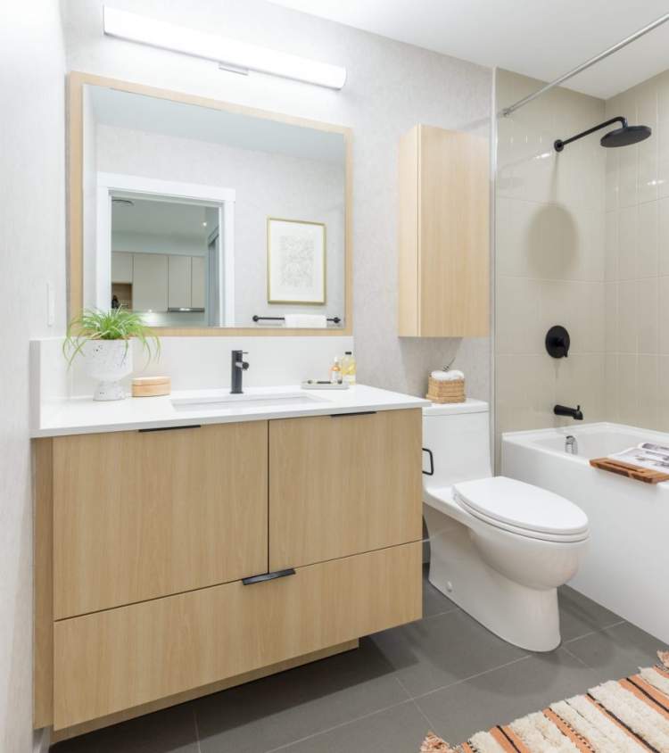 Hartley Surrey Bathrooms - Outfitted with custom vanities and a soaker tub or super-sized shower.