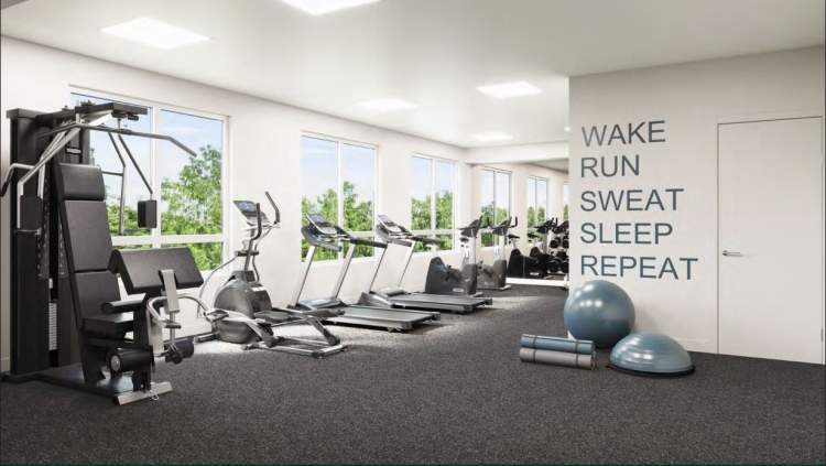 A fully-equipped gym with cardio & weights faces onto the courtyard.