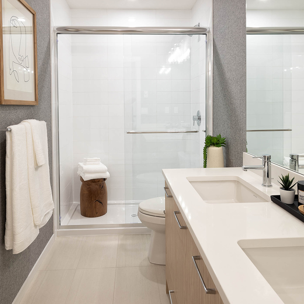 En suites with oversized showers and double vanities.