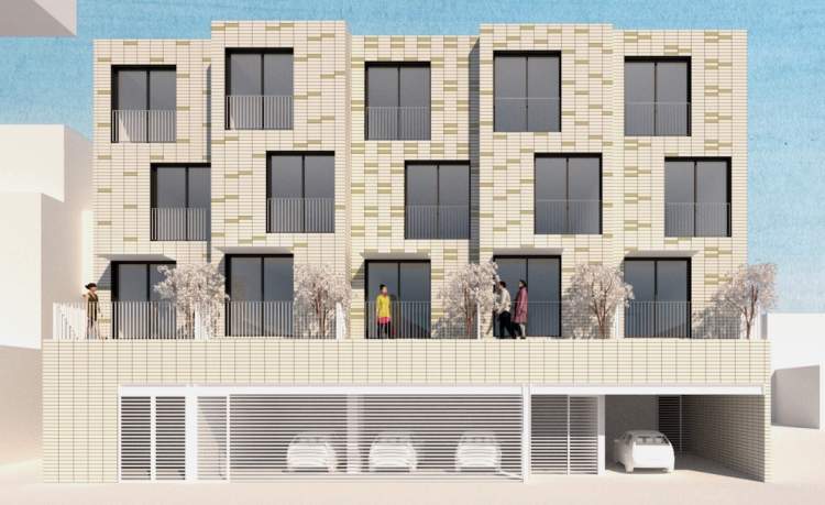 A 4-storey infill building with 10 stacked 1- & 2-bedroom courtyard townhomes.