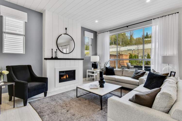 All homes include vaulted ceilings, wide-plank flooring, and gas or electric fireplace.