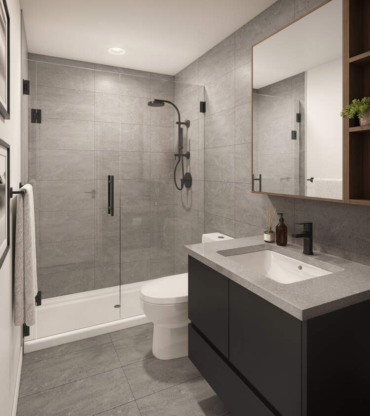 Walker House bathrooms feature quartz countertops, Kohler fixtures, and a mirrored medicine cabinet.
