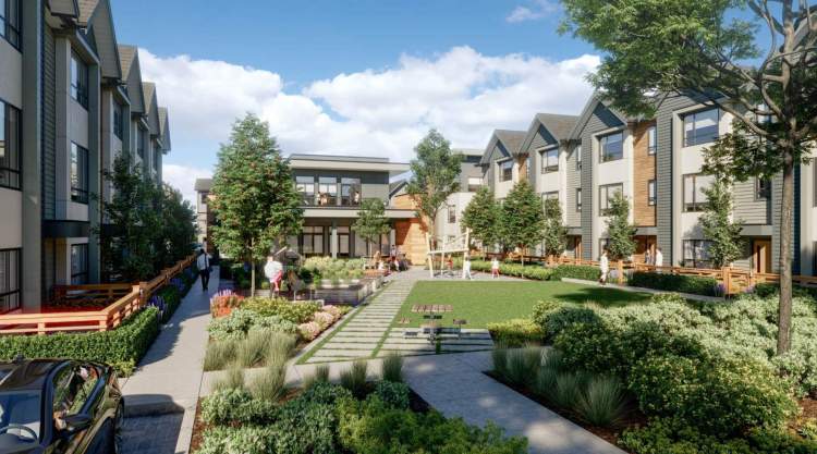 At the centre of the townhome buildings is a 2-storey amenity building and a landscaped commons.