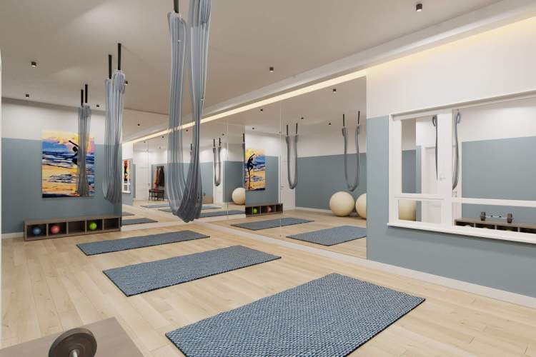 Indoor resident amenities include a boardroom and a fitness studio.
