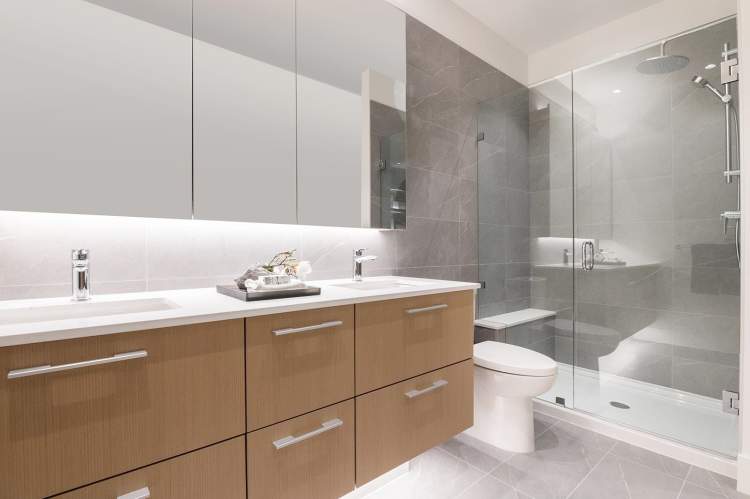 Luxurious showers include integrated bench seating.
