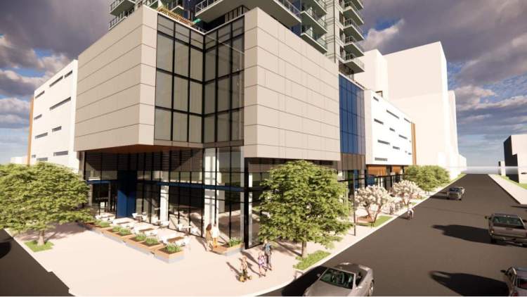 A 5-storey podium includes ground floor retail space and a parkade.