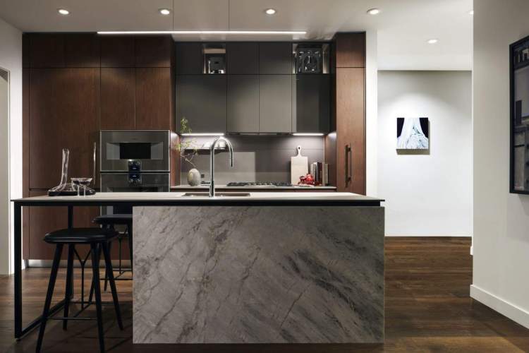 Italian-designed kitchens by Miton showcase custom cabinetry with ample storage.