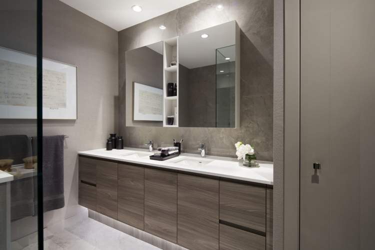 Vanities with expansive storage and spacious counters.