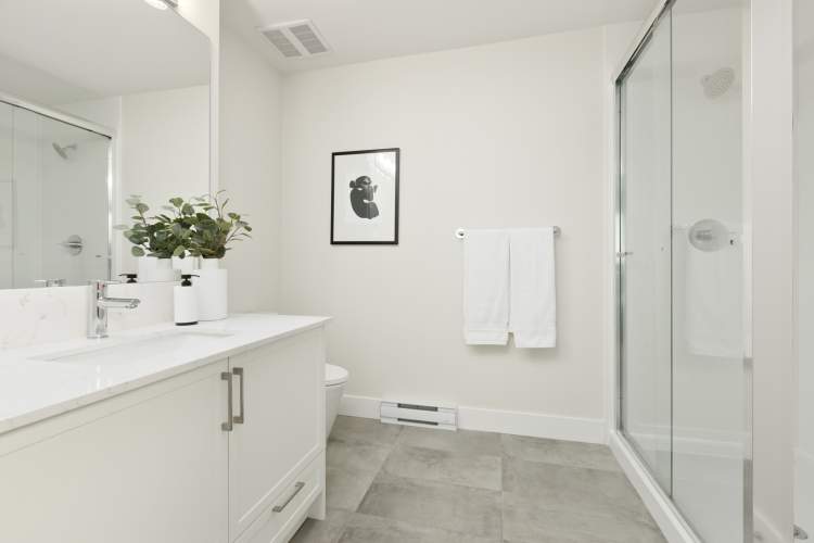 Spa-inspired showers and sleek undermount sinks.