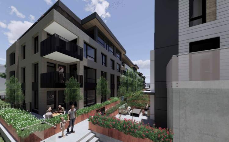 A courtyard between the condo & townhome buildings provides space for private patios.