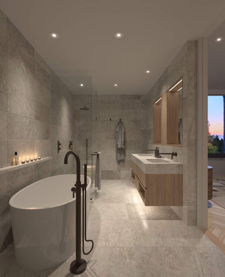 Stone-clad walls, floors, and ceiling provide a backdrop for a double sink vanity and a freestanding tub.