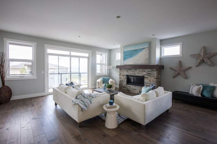 Open-concept layouts and oversized windows embrace the views of the Okanagan Valley.