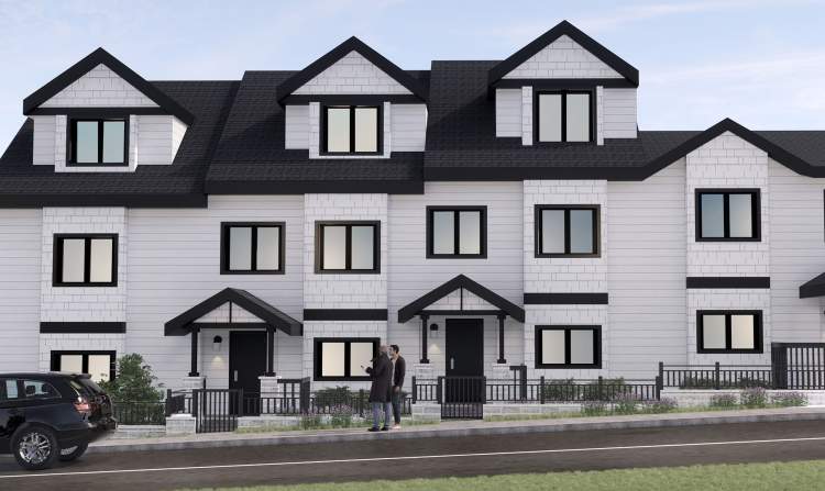 Exterior view of the west-facing townhomes from Knight Street.