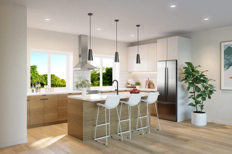 The kitchen is sleek and modern with contemporary fixtures.