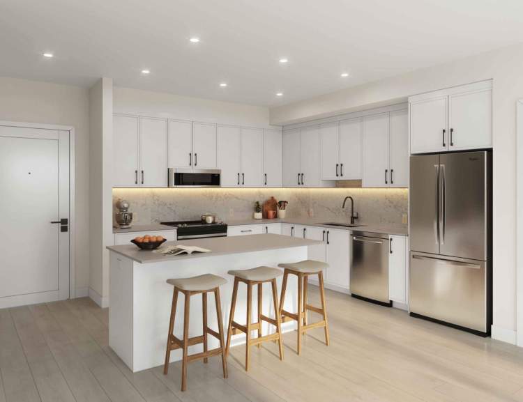Kitchens feature an island or peninsula and Whirlpool stainless steel appliances.