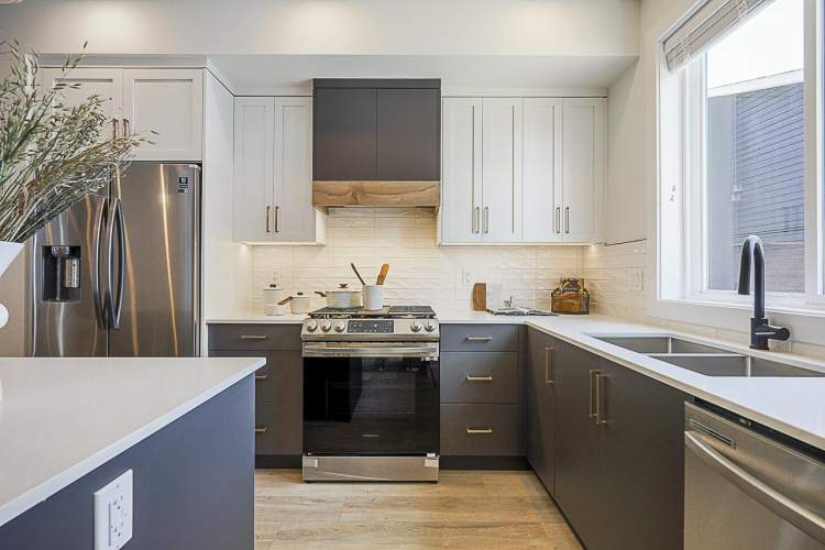Designed for serious cooks with stainless steel appliances, Shaker cabinetry, and task lighting.