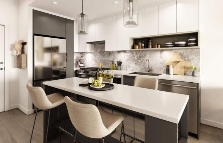 Modern finishes and appliances including a Samsung gas range and Moet kitchen faucet.
