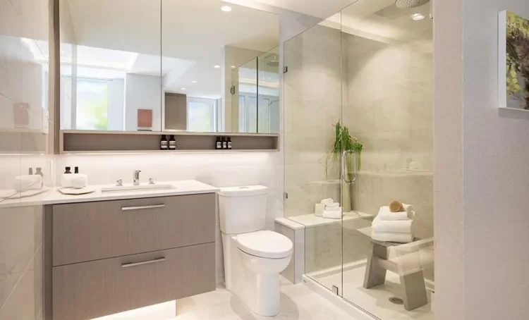 Features porcelain wall tiles, large-format mirrors, and floating cabinetry.