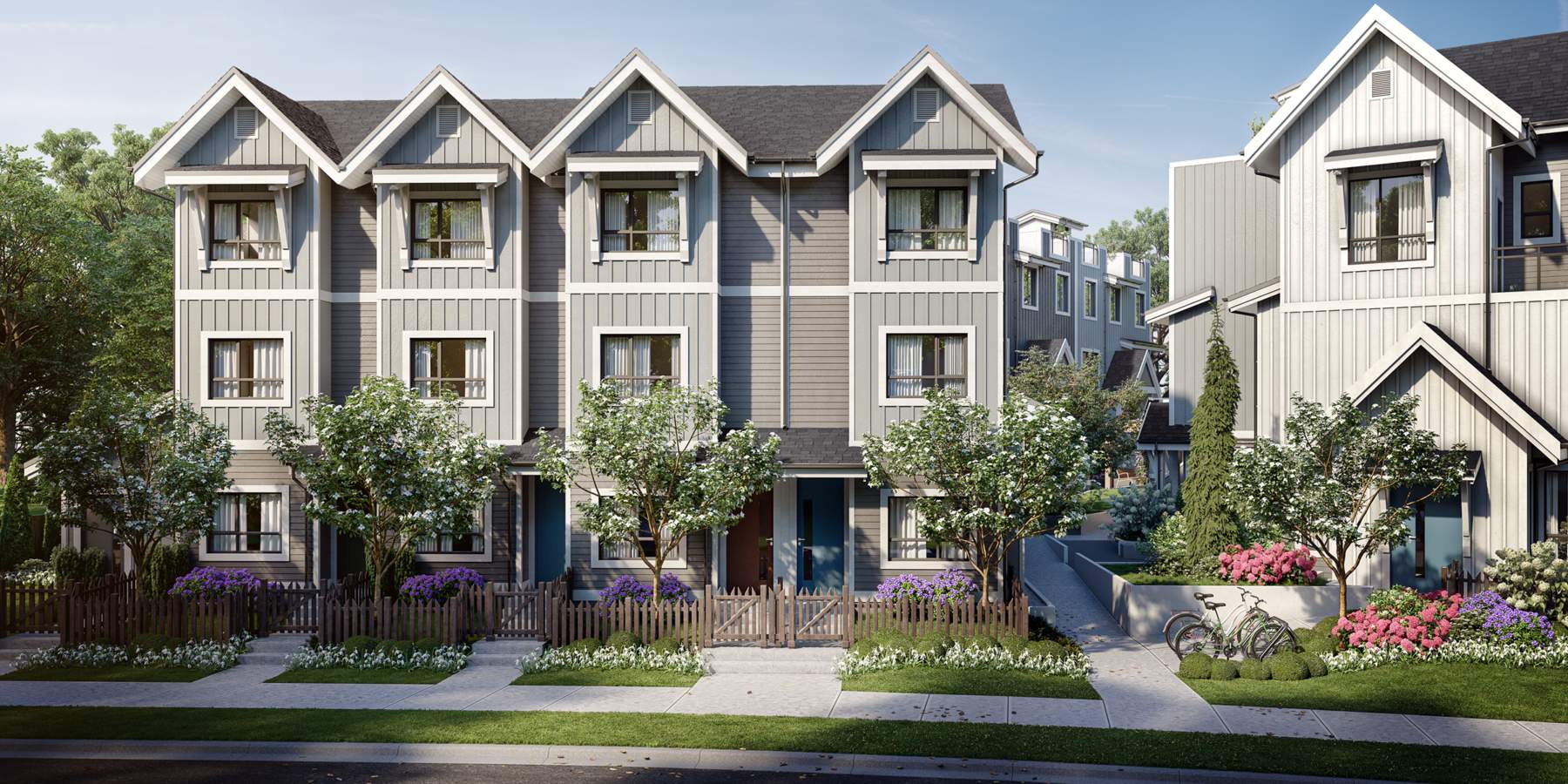 A collection of 23 Coquitlam townhomes in three 3-storey woodframe buildings.