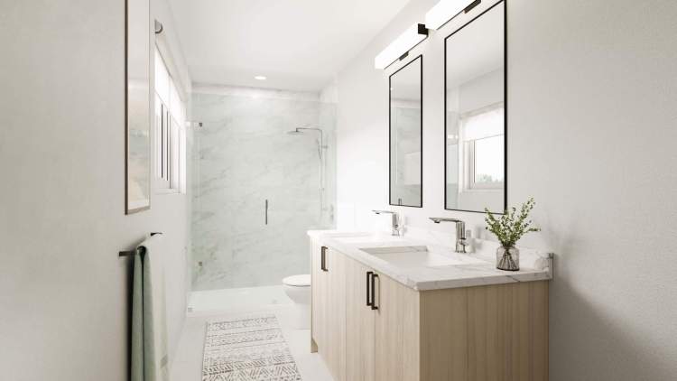 Ensuites offer his & hers vanities with dual mirrors and overhead lighting.