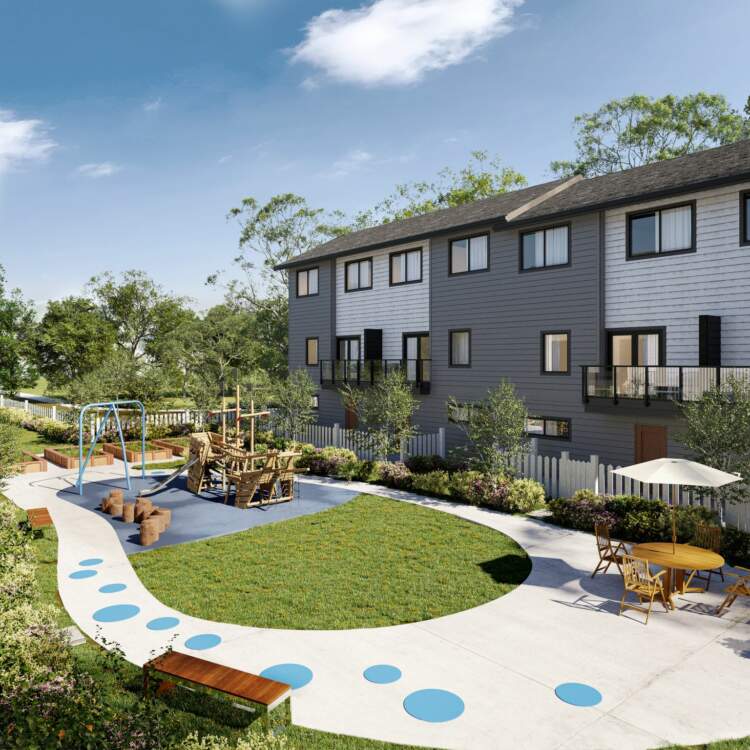 Gordon Square townhomes feature a central common space with a children's play area.