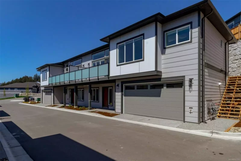 Westview Townhomes exterior showing driveway and garages.