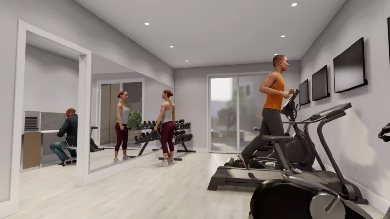 The Grand Langford indoor amenity that includes a gym and workstation.